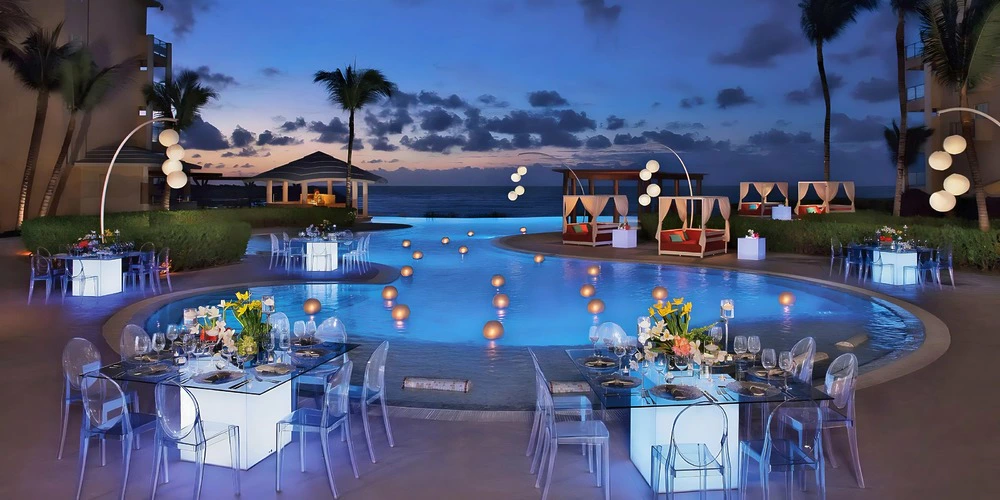 Preferred Club Pool Terrace evening wedding reception at Dreams Jade Riviera Cancun