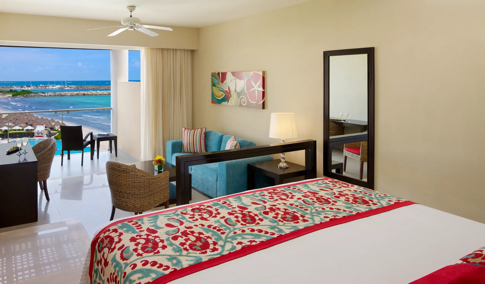 Junior Suite Ocean Front View king bed with balcony and Caribbean Sea views at Dreams Jade Resort & Spa.